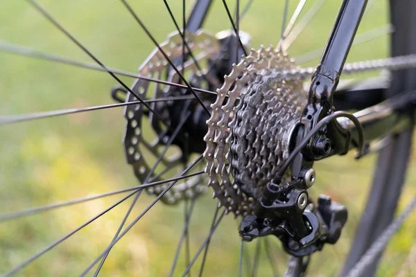 Close up of bicycle gears mechanism and chains on the rear wheel of a mountain bike.