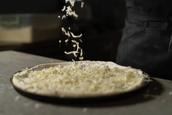 Grated Hard Cheese Lays Pizza Process Cooking Production Pizzeria Restaurant — Stock Photo, Image