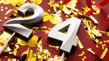 Kırmızı bayramda konfeti arkaplanlı 24 numaralı doğum günü rakamı. 24 'üncü yaş günü. Doğum günü, yıldönümü ve tarih kavramı. yakın plan