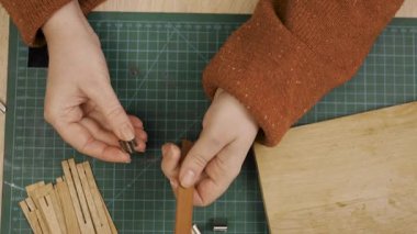 Preparing wooden wicks for Handmade Candle. concept of candle-making process. top view