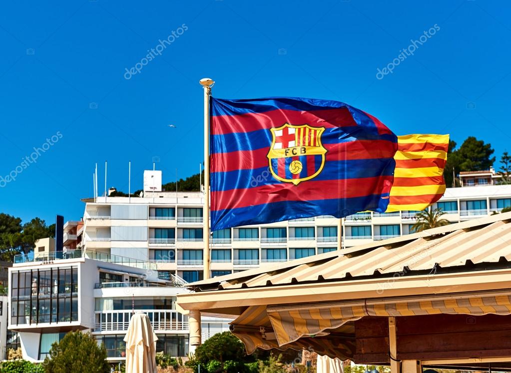 Waving flag of FCB (Futbol Club Barcelona). Tossa de Mar town. Catalonia, Spain