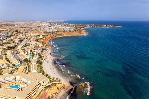 西班牙旅游胜地科斯塔布兰卡的Dehesa Campoamor的无人驾驶飞机观点 沙滩海岸线和地中海蓝绿色水域 暑假的概念 西班牙 — 图库照片