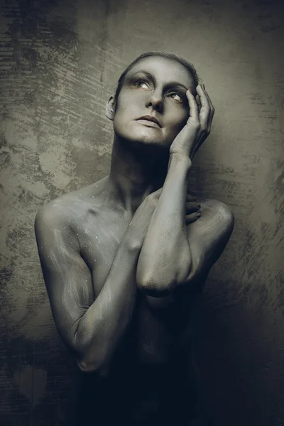 Portrait of a woman with gray body-art — Stock Photo, Image