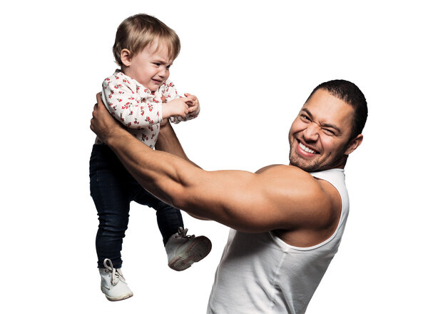 Father holding a crying daughter