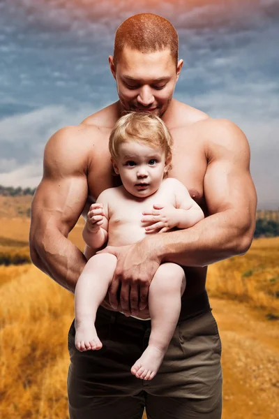 Atletische vader met mooie kleine dochter — Stockfoto