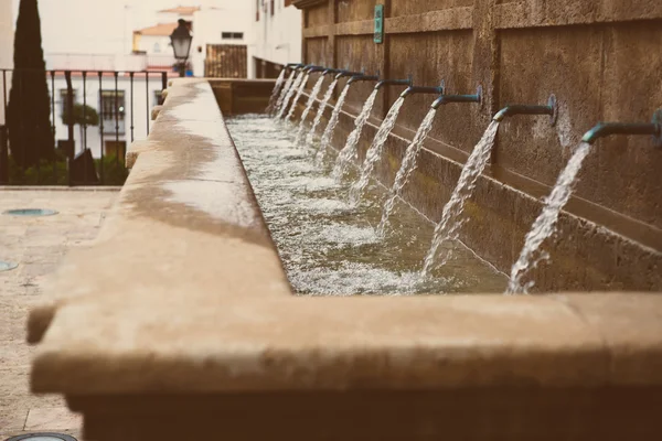 Drinking fountain outdoors. Spain — Zdjęcie stockowe