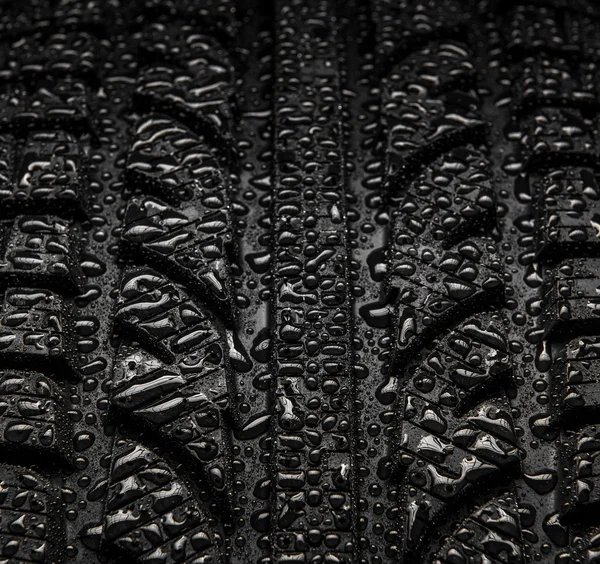 Close-up textuur van band met water drops — Stockfoto