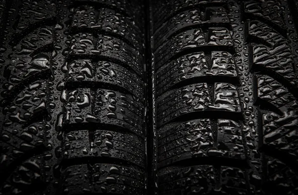 Close-up texture of tires with water drops