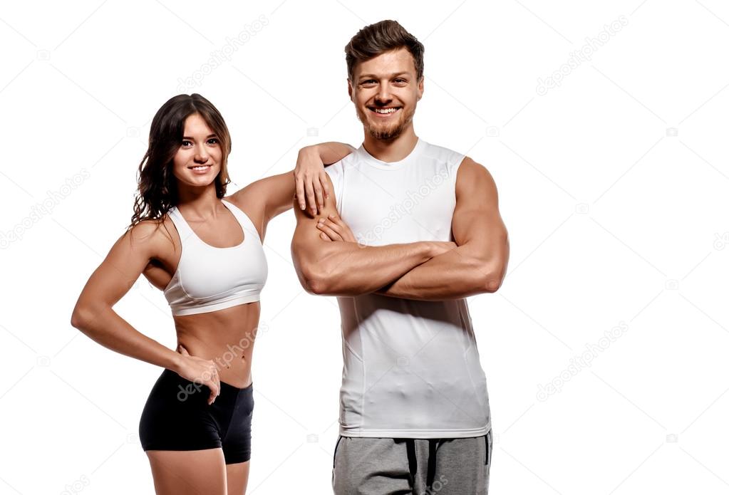 Young and beautiful athletic woman and man