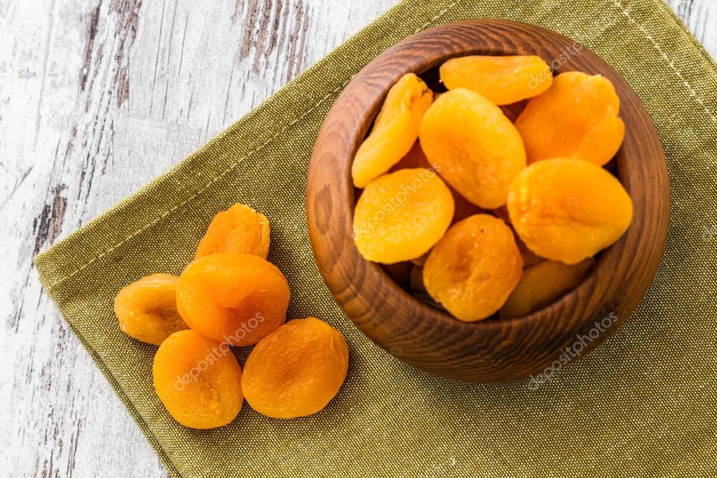 Dried Apricots in Wooden Bowl