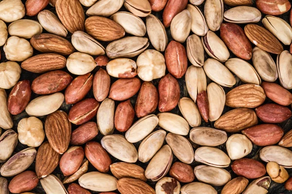 Pistachios, Nuts, Almonds and Hazelnuts Texture and Background — Stock Photo, Image