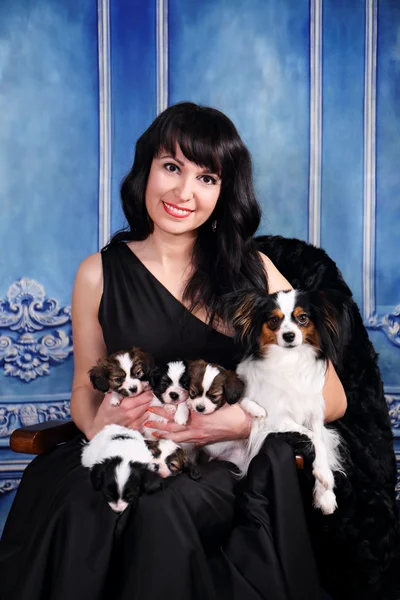 Elegant lady with a dogs — Stock Photo, Image