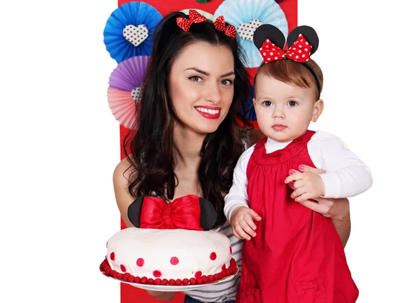 Madre e hija con pastel — Foto de Stock