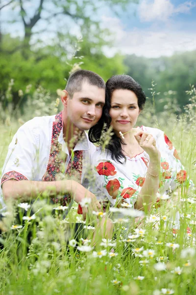 Portrait in field with daisies — Stock Photo, Image