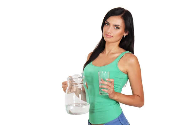 Mulher segurando um jarro de água e um copo — Fotografia de Stock