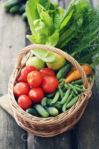 Different vegetables in big basket. top view — Stock Photo, Image