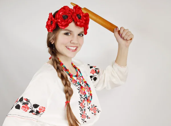 Mujer con un rodillo —  Fotos de Stock