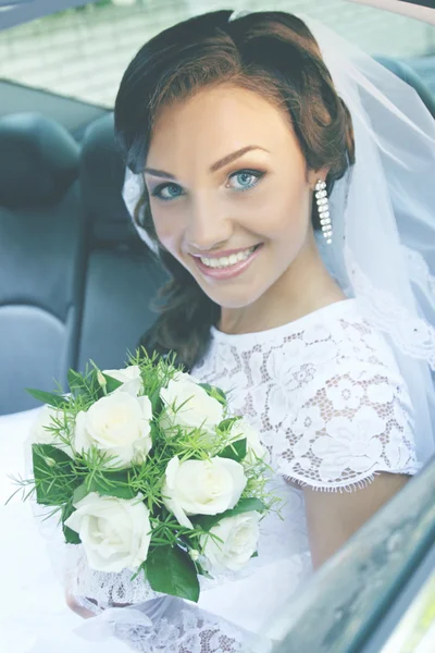 Bride in car, tinted — Stock Photo, Image