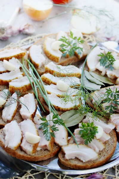 Lard with garlic and herbs — Stock Image Lard with garlic and herbs Royalty Free Stock Images