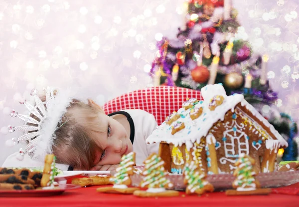 Girl looks out the window ginger house — Stock Photo, Image