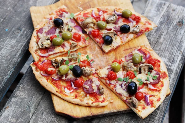 Italian pizza with mushrooms, cheese and olives — Stock Photo, Image