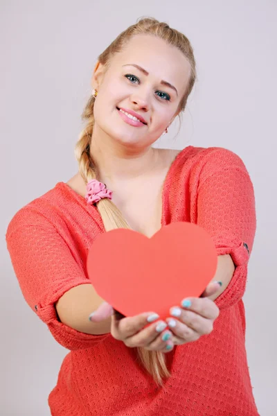 Holding a heart — Stock Photo, Image