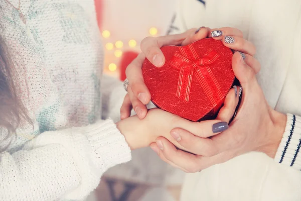 Holding gift, tinted — Stock Photo, Image