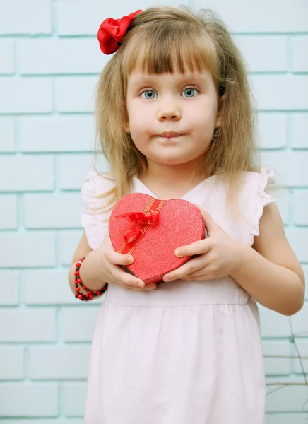 Little  Girl with a gift — Stock Photo, Image