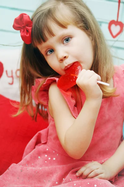 Beautiful girl with lollipop — Stock Photo, Image