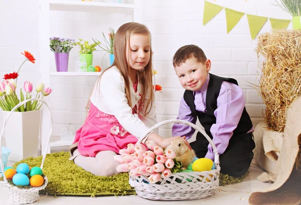 Children stroking rabbit — Stock Photo, Image