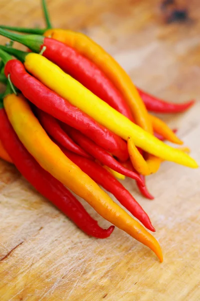 Chili  on a wooden board — Stock Photo, Image