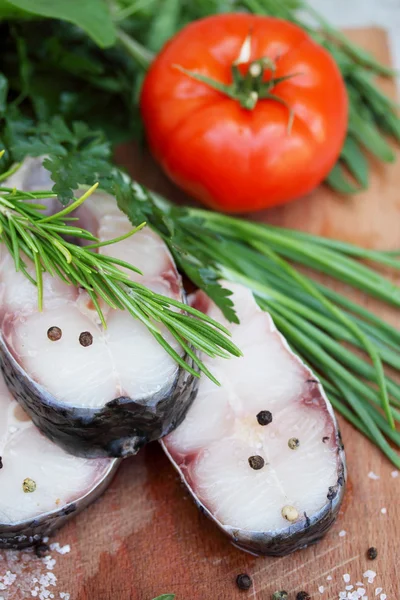 Fish with rosemary and pepper — Stock Photo, Image