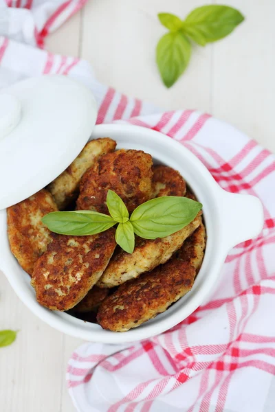 Fish cutlets countrylike in saucepan — Stock Photo, Image