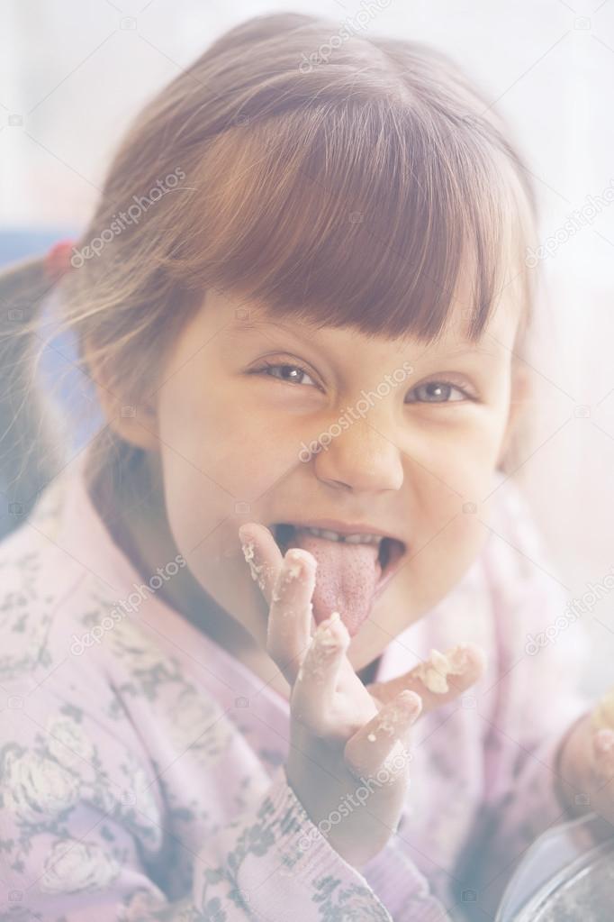 girl eating pastry