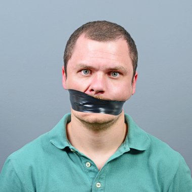 Kidnapped man with tape over his mouth clipart