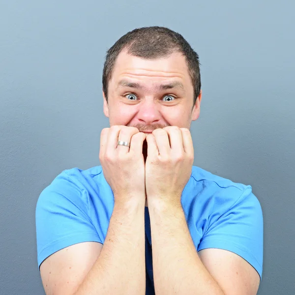 Man biting his nails - Bad habit concept — Stock Photo, Image