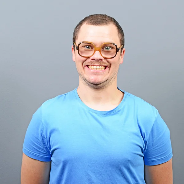 Portrait of a geek looking guy with huge glasses — Stock Photo, Image