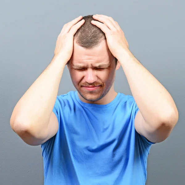 Portrait of a man suffering from headache — Stock Photo, Image