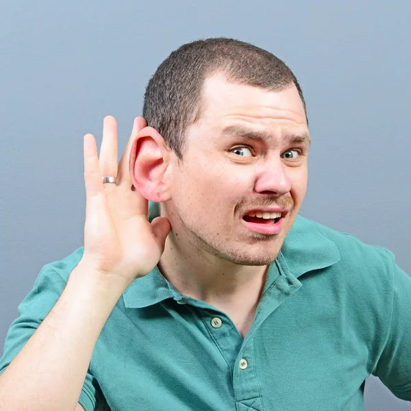 Portrait of man with huge ear listening on private conversation — Stock Photo, Image