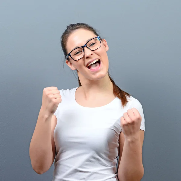 Portrait of happy woman exults pumping fists ecstatic celebrates — Stock Photo, Image