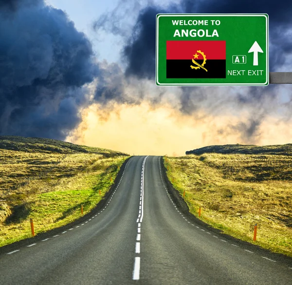 Angola road sign against clear blue sky — Stock Photo, Image
