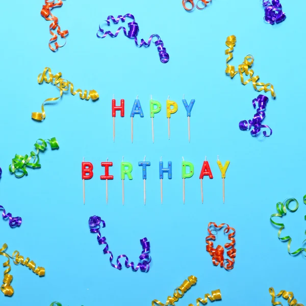 Happy Birthday flat lay party decorations on blue background — Stock Photo, Image