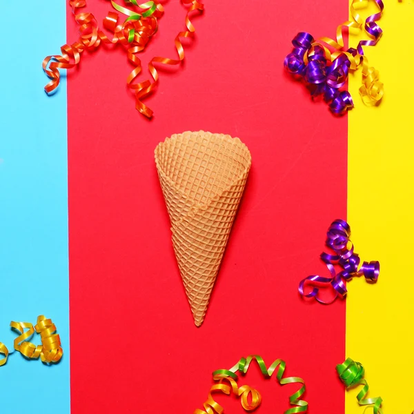 Ice cream cones with colorful confetti on colorful background - — Stock Photo, Image