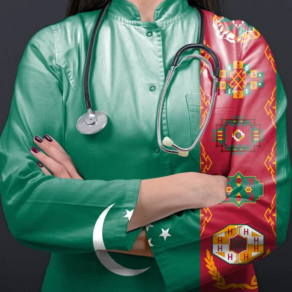 具有土库曼斯坦国旗的代表保健系统的医生 — 图库照片