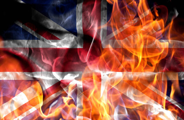 Demonstrations or war concept - Burning in flames national flag of Great Britain