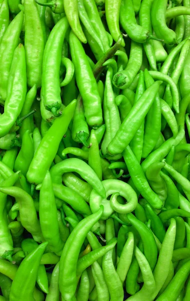 Green peppers background — Stock Photo, Image