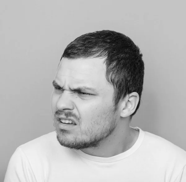 Portrait of man with dusgusted gesture - Monocrome or black and — Stock Photo, Image