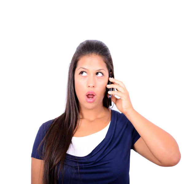 Beautiful woman talking on cellphone and being in shock of news — Stock Photo, Image