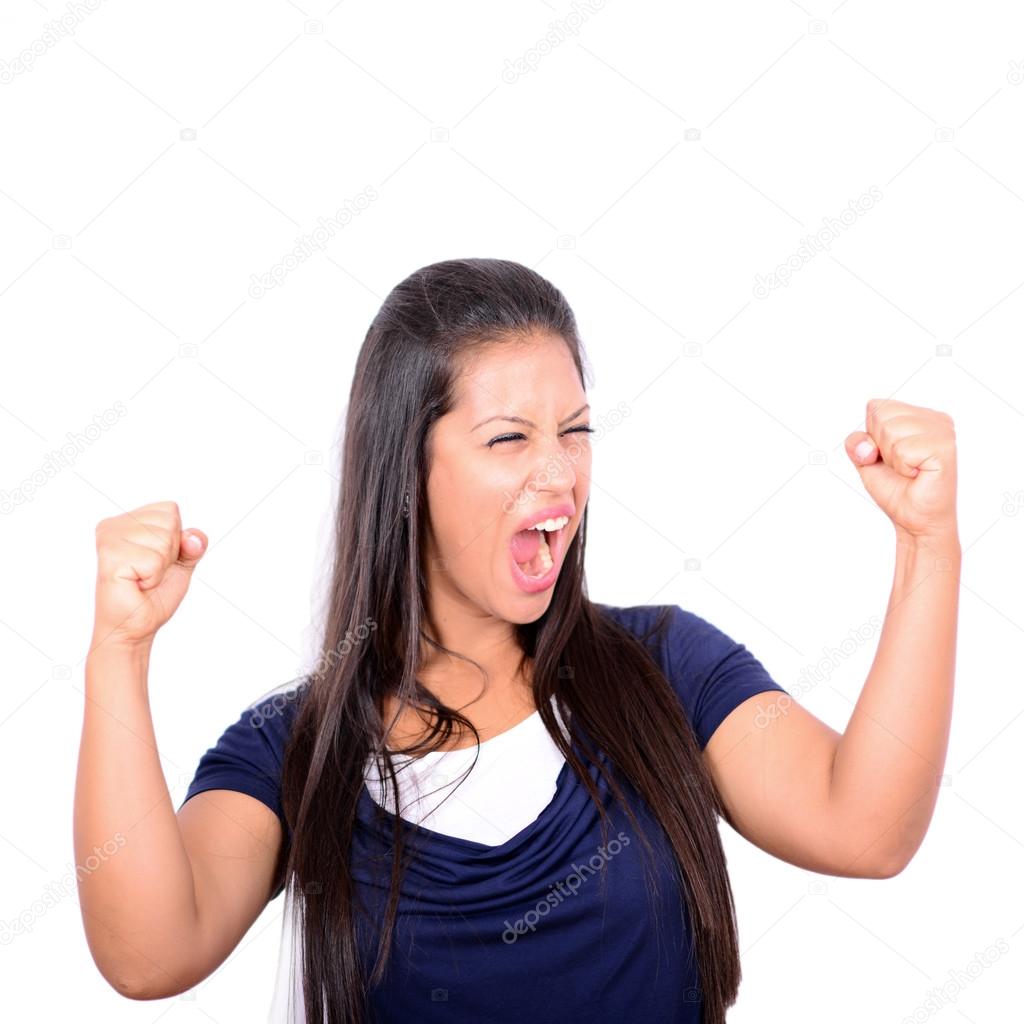 Excited happy success young woman with fists up isolated on whit