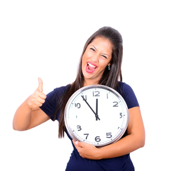Portrait of beautiful young woman holding big clock with thumbs — Stock Photo, Image